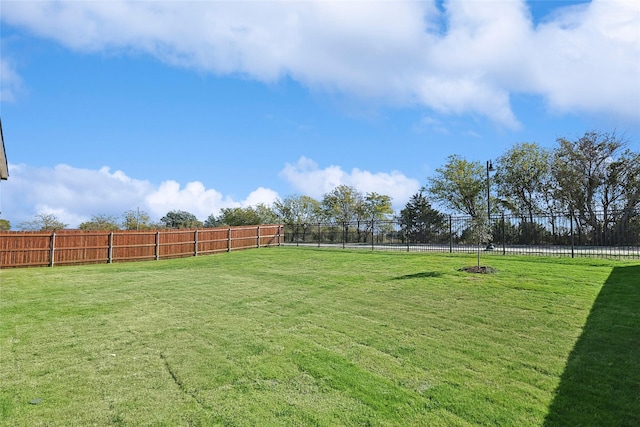 view of yard featuring fence