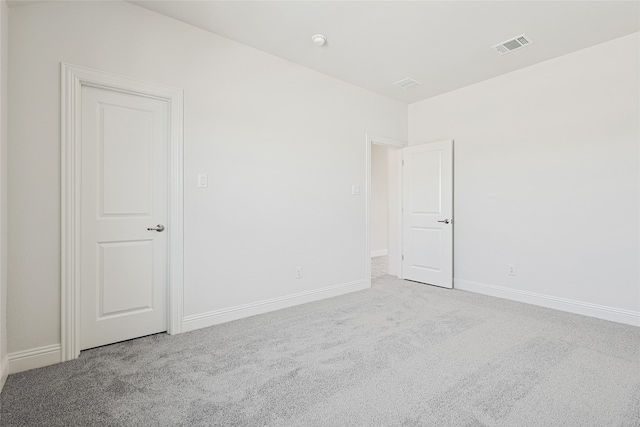 empty room with carpet floors