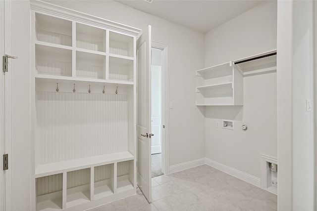 mudroom with light tile patterned floors