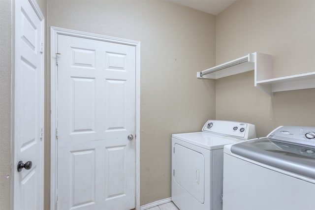 washroom with washer and clothes dryer