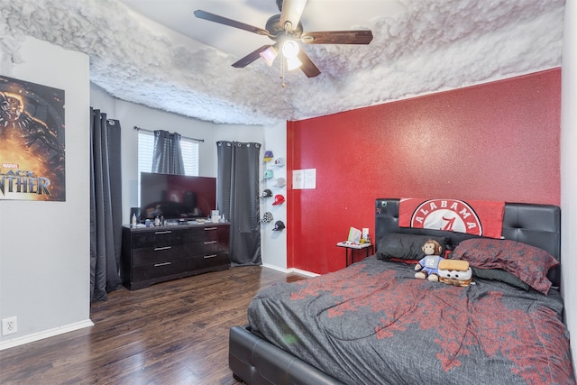 bedroom featuring ceiling fan and dark hardwood / wood-style flooring