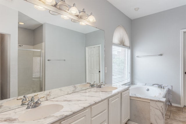 bathroom with independent shower and bath, tile patterned flooring, and dual bowl vanity