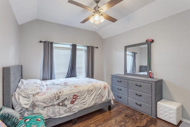 bedroom with lofted ceiling, ceiling fan, and dark hardwood / wood-style floors