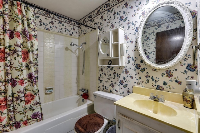 full bathroom featuring vanity, toilet, and shower / bathtub combination with curtain