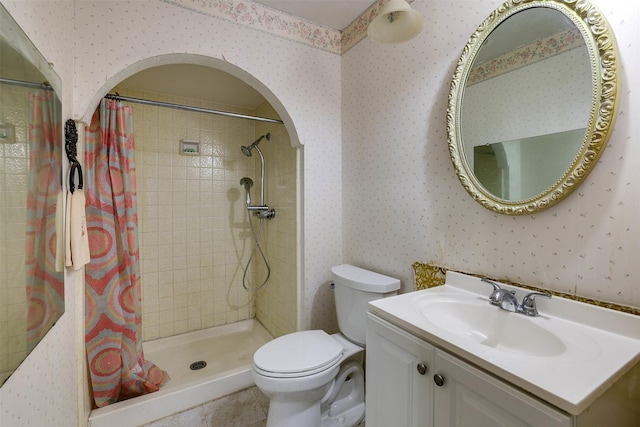 bathroom featuring vanity, toilet, tile patterned floors, and a shower with shower curtain