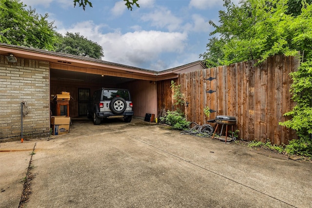 exterior space featuring a carport