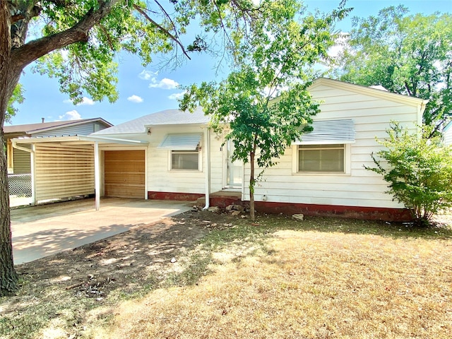 view of front of home featuring a carport