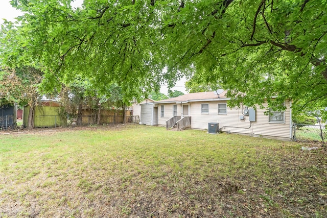 view of yard featuring central AC