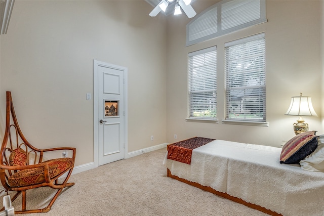 bedroom featuring carpet and ceiling fan