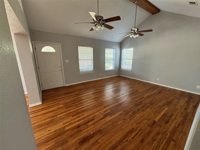 entryway featuring dark wood-type flooring, ceiling fan, and vaulted ceiling with beams