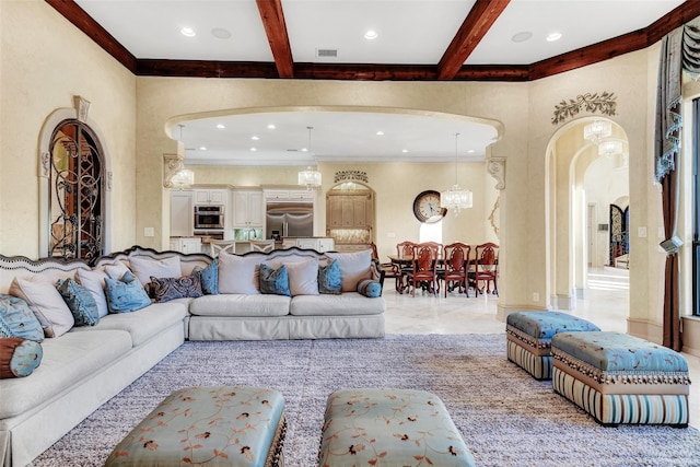 tiled living room featuring beamed ceiling, an inviting chandelier, and crown molding