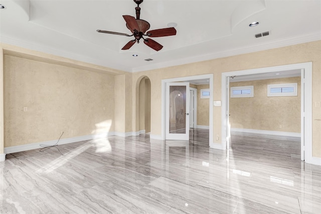 unfurnished room featuring tile patterned flooring, ornamental molding, and ceiling fan