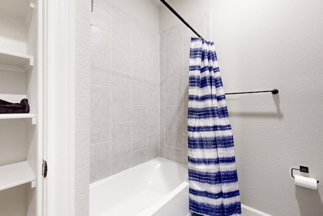 bathroom with shower / bathtub combination with curtain