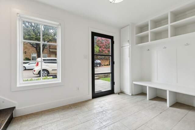 mudroom featuring baseboards