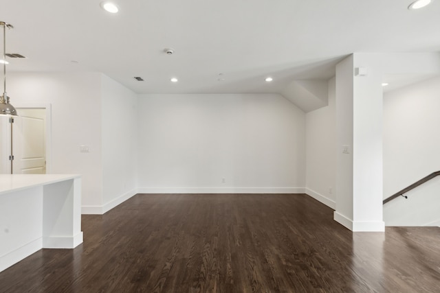 spare room featuring wood-type flooring