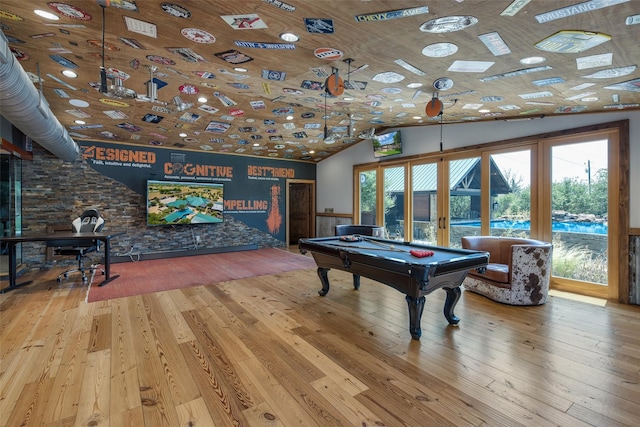 playroom featuring wood-type flooring, billiards, and plenty of natural light