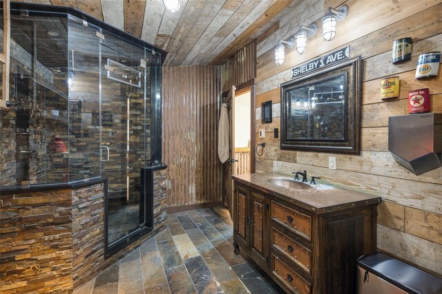 interior space with dark tile patterned floors, dark brown cabinets, wooden walls, wood ceiling, and sink