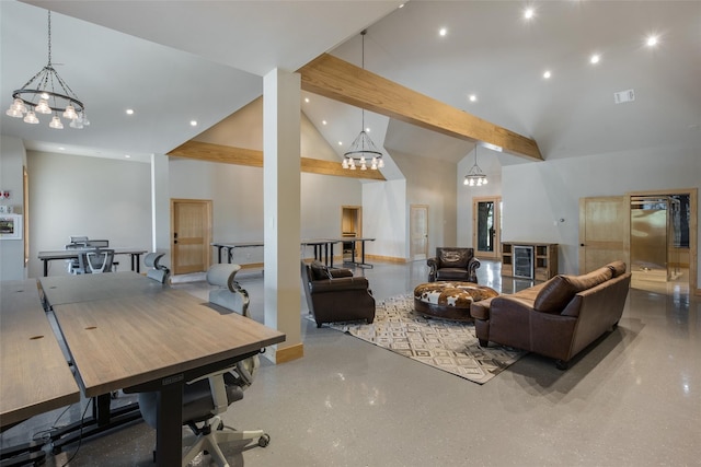 living room with high vaulted ceiling, beamed ceiling, and a chandelier