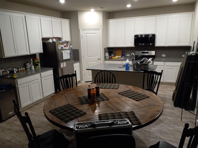 dining room featuring light hardwood / wood-style floors