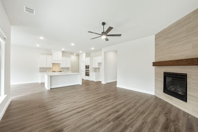 dining space with lofted ceiling and wood-type flooring