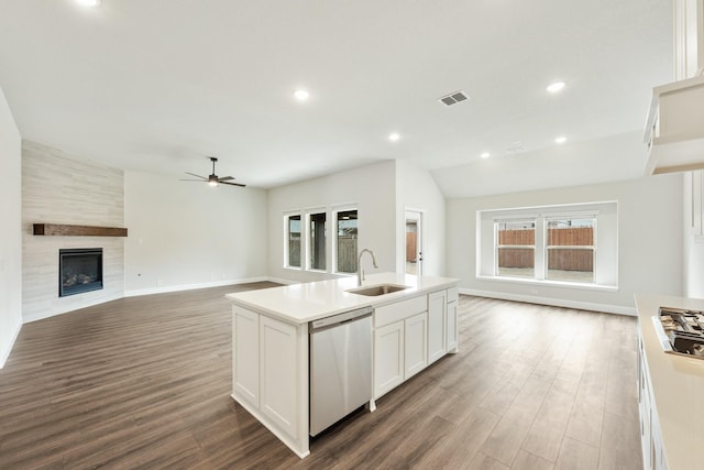 carpeted bedroom featuring multiple windows and ceiling fan