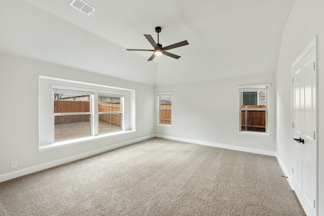 living area with light colored carpet and lofted ceiling