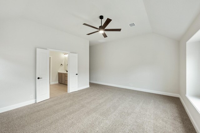 carpeted empty room with ceiling fan