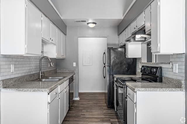 kitchen with sink, dishwasher, white cabinetry, dark hardwood / wood-style flooring, and black / electric stove