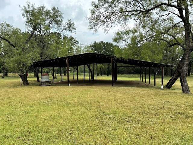 view of home's community featuring a lawn