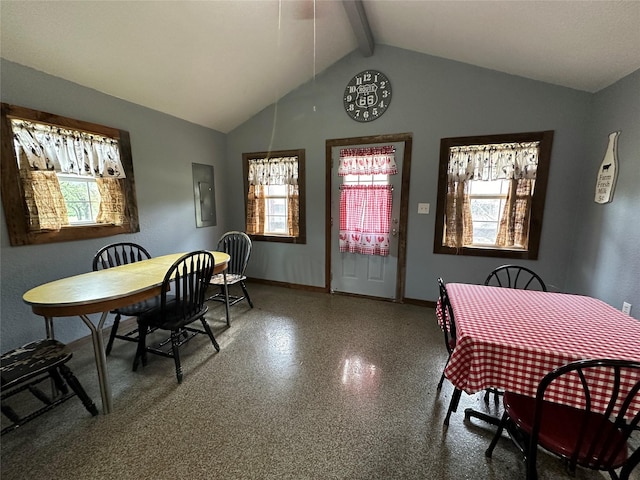 dining room featuring electric panel, lofted ceiling with beams, and baseboards