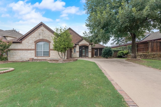 view of front of home with a front lawn