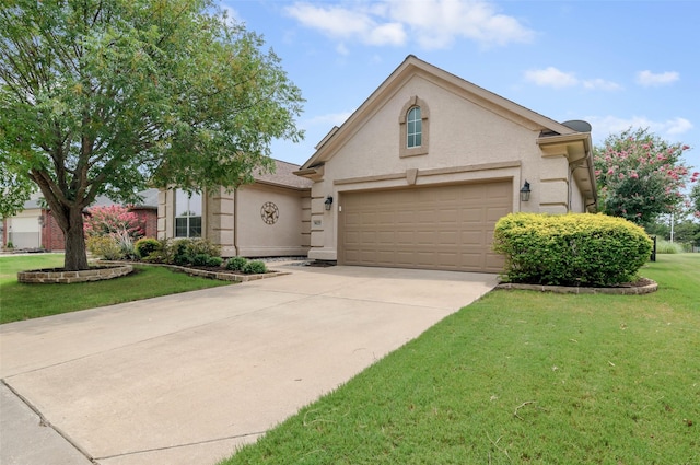 view of front of house with a garage and a front yard