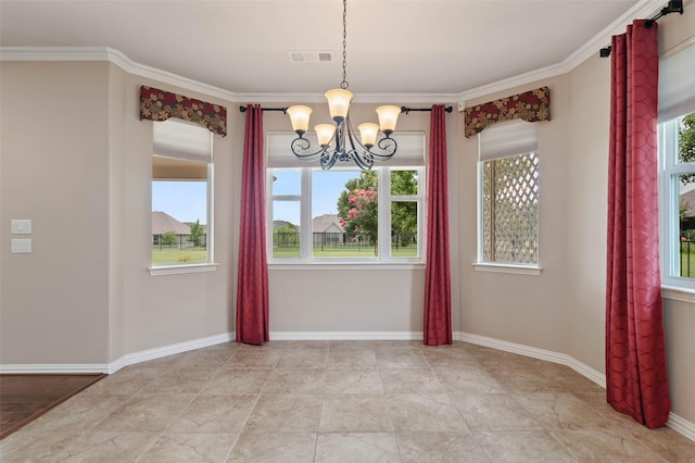 unfurnished dining area with crown molding and a chandelier