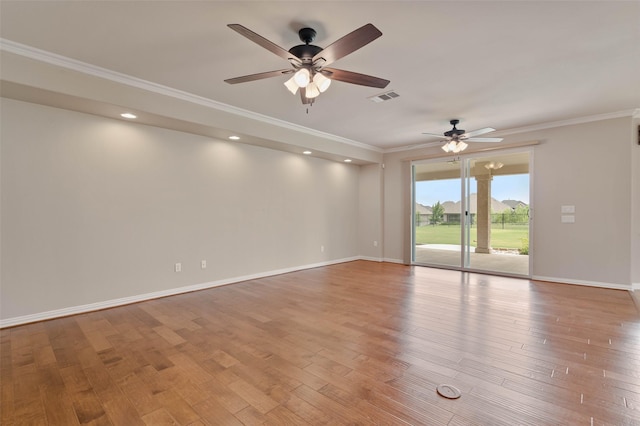 empty room with crown molding, ceiling fan, and light hardwood / wood-style floors