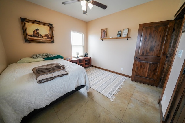 bedroom with light tile patterned floors and ceiling fan