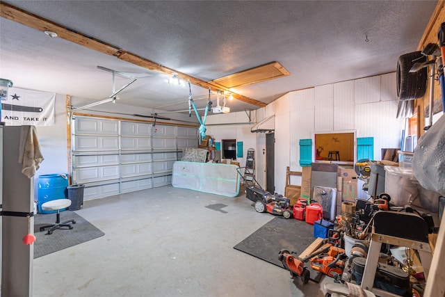 garage featuring a garage door opener