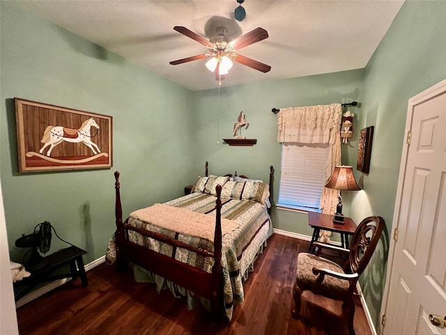 bedroom featuring dark wood-type flooring and ceiling fan