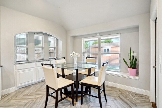 dining room featuring light parquet floors