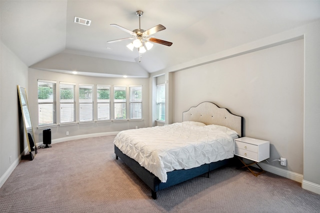 bedroom featuring carpet floors, lofted ceiling, and ceiling fan