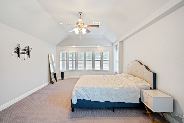 bedroom with vaulted ceiling, carpet floors, and ceiling fan