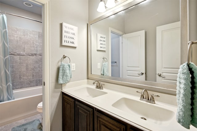 full bathroom with toilet, tile patterned floors, double sink vanity, and shower / bath combo