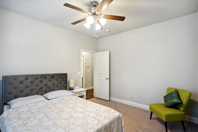 bedroom with ceiling fan and carpet flooring