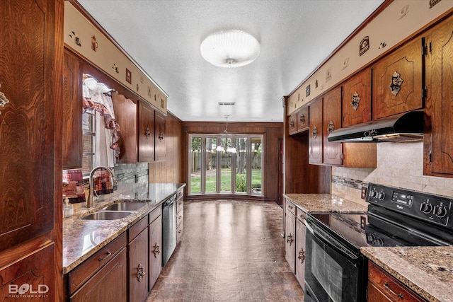 kitchen featuring stainless steel dishwasher, sink, decorative light fixtures, light stone counters, and black range with electric cooktop