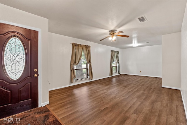 foyer with hardwood / wood-style flooring and ceiling fan