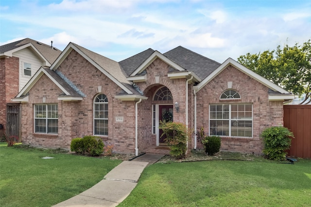 view of front of house with a front lawn