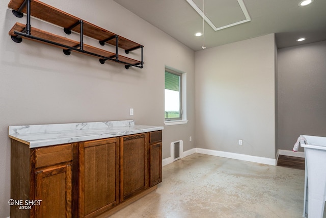 interior space featuring concrete floors