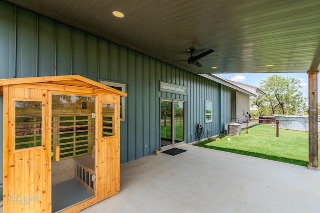 view of patio featuring ceiling fan and cooling unit