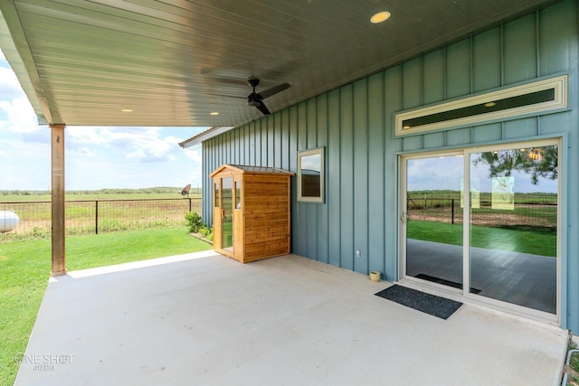 view of patio / terrace with a rural view and ceiling fan