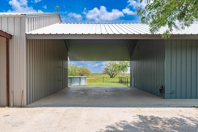 view of parking / parking lot with a carport