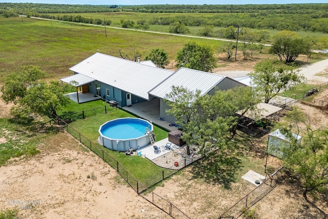 birds eye view of property featuring a rural view